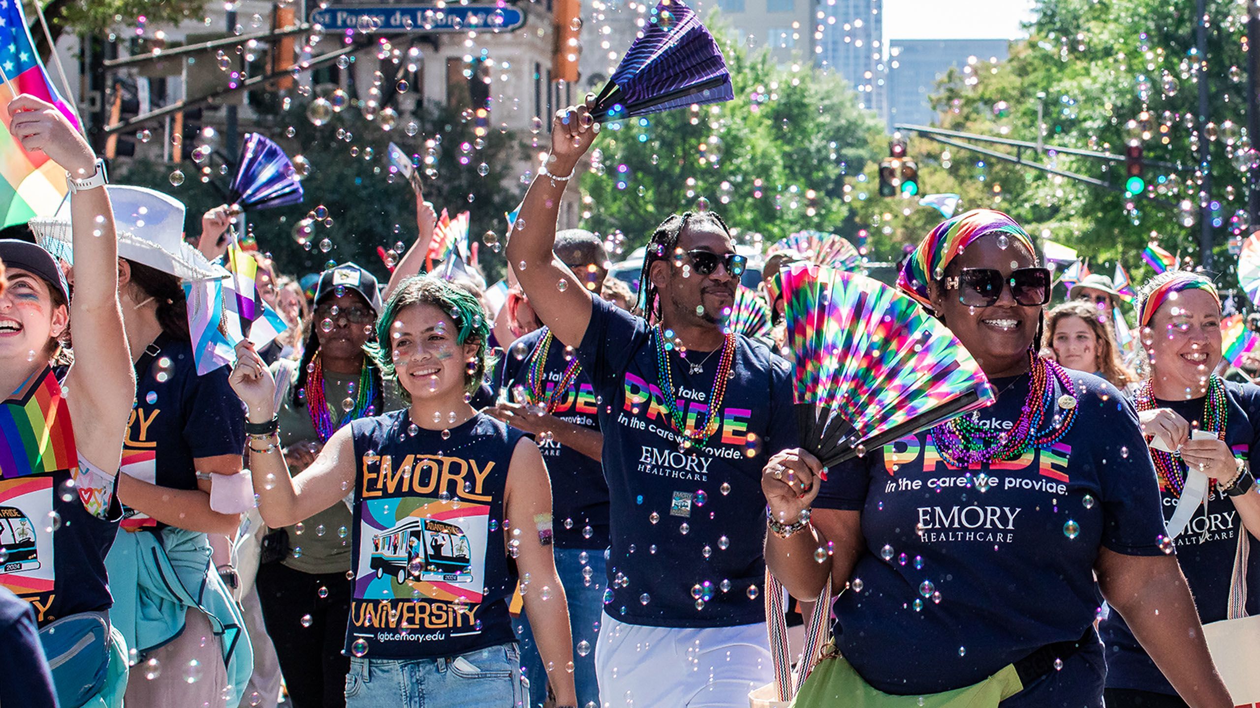 parade walkers smiling amidst bubbles
