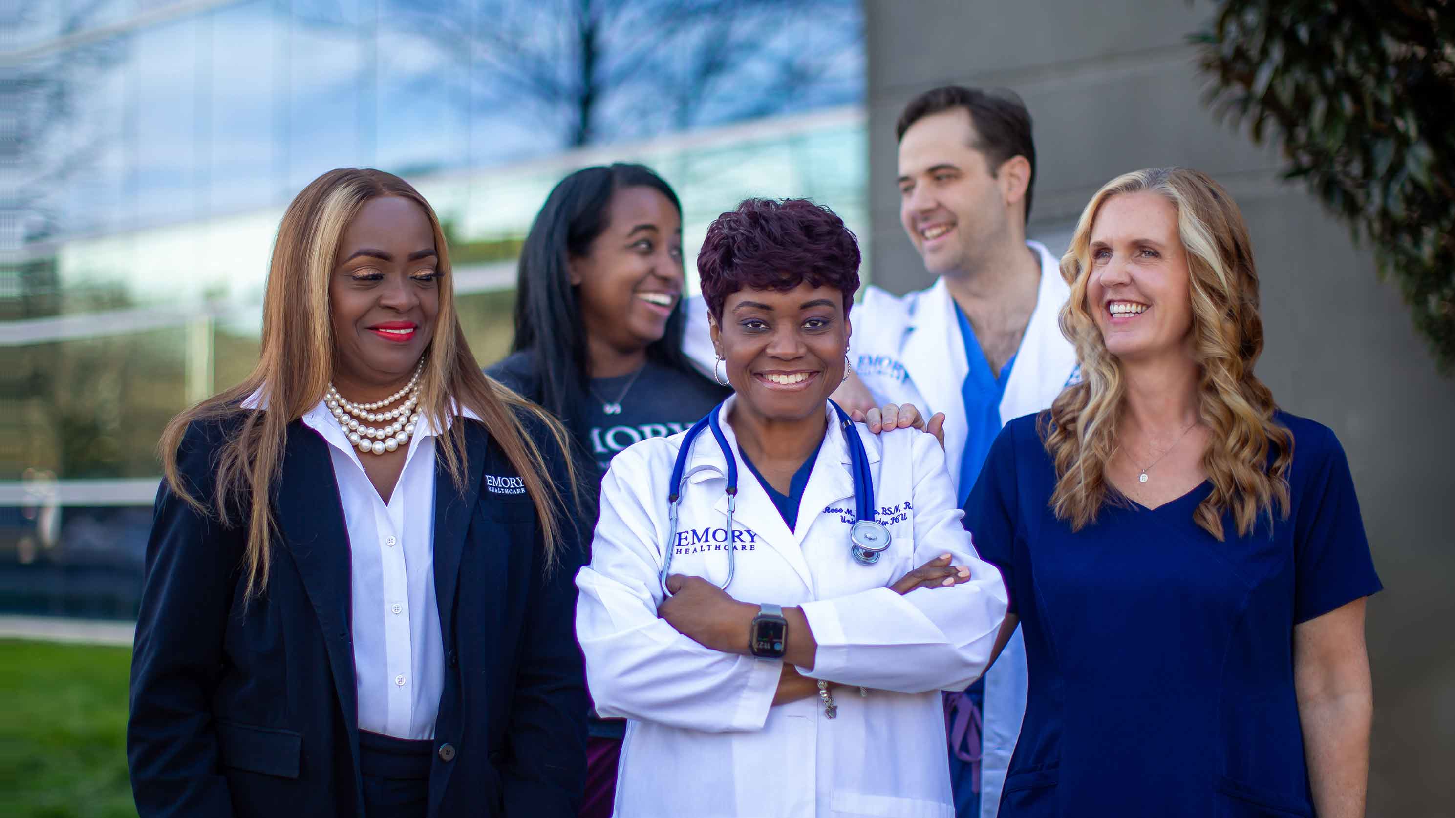 Smiling team members outside of Emory Hillandale Hospital
