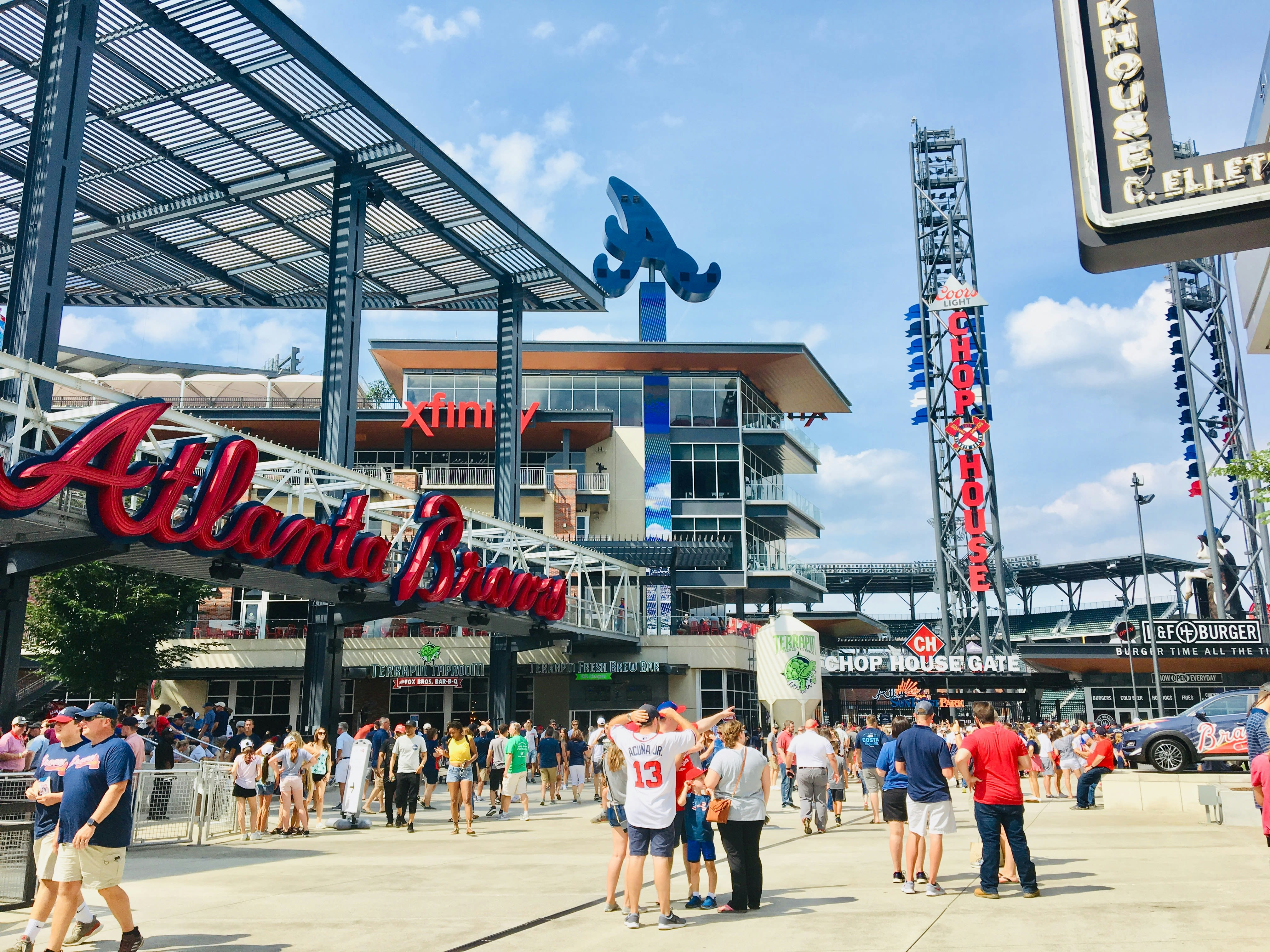 people in Braves stadium during daytime